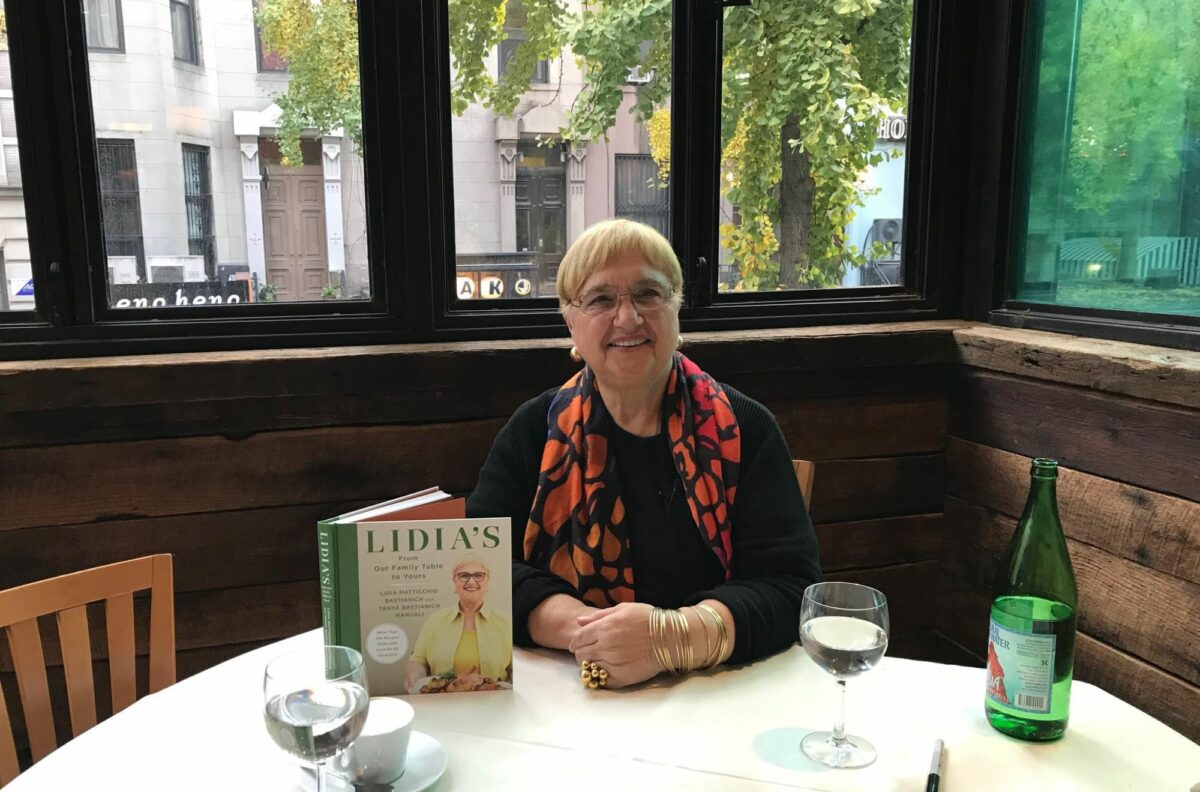 LIdia Bastianich Seated with Book